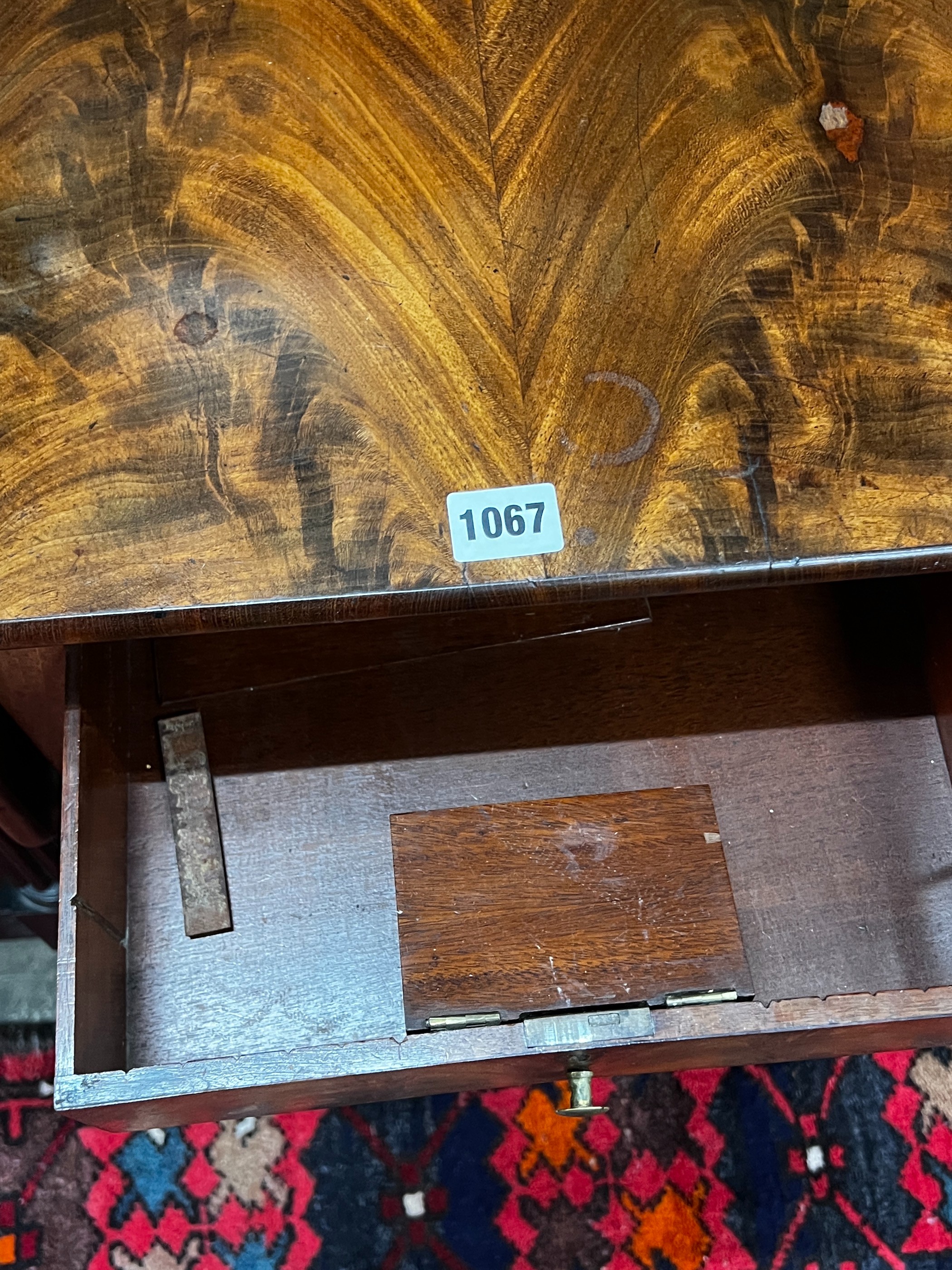 A 19th century French mahogany drop flap work table, width 38cm, depth 47cm, height 63cm